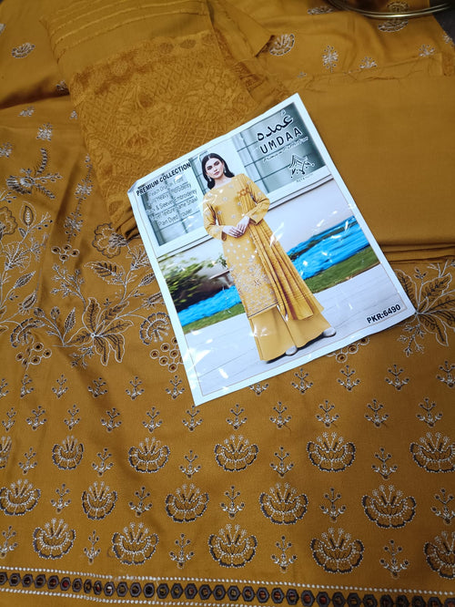 Peach dhanak 3pc, embroidered front back nd sleeves wd plan trouser nd velvet dhanak shawl....