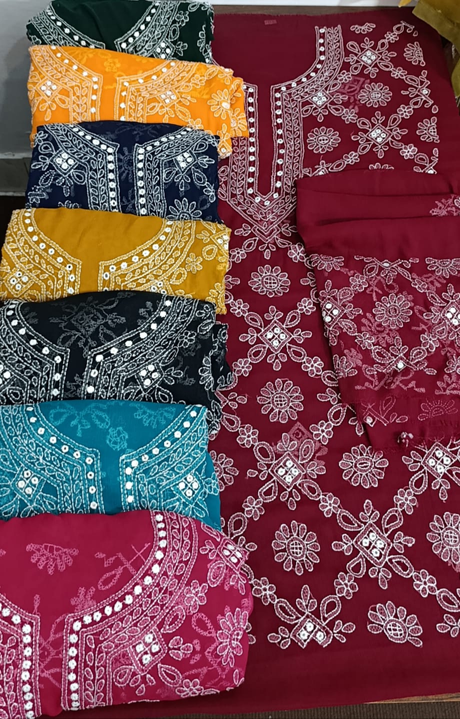 Semi Pure Chiffon 2pc handmade, chknkari wd mirror work on shirt sleeves nd dupta...
